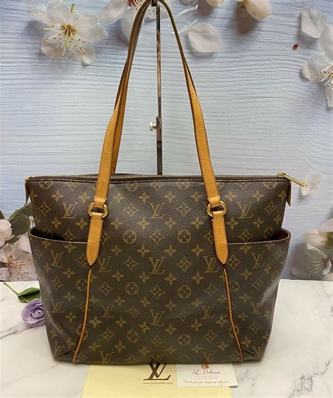 lv monogram totally mm|Lv large monogram tote.